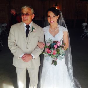 bride with father in vintage wedding venue