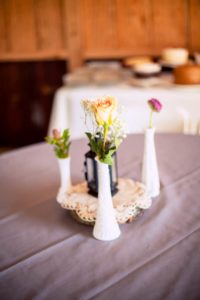 vintage wedding centerpieces with white vases
