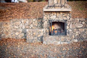 Fireplace outside at rustic wedding venue in georgia
