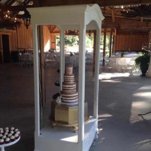 4 tier wedding cake in vintage wedding venue