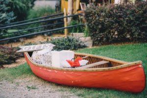 canoe with gifts at vintage wedding venue