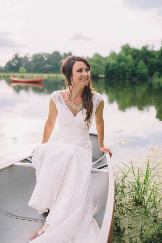 bride in canoe on lake