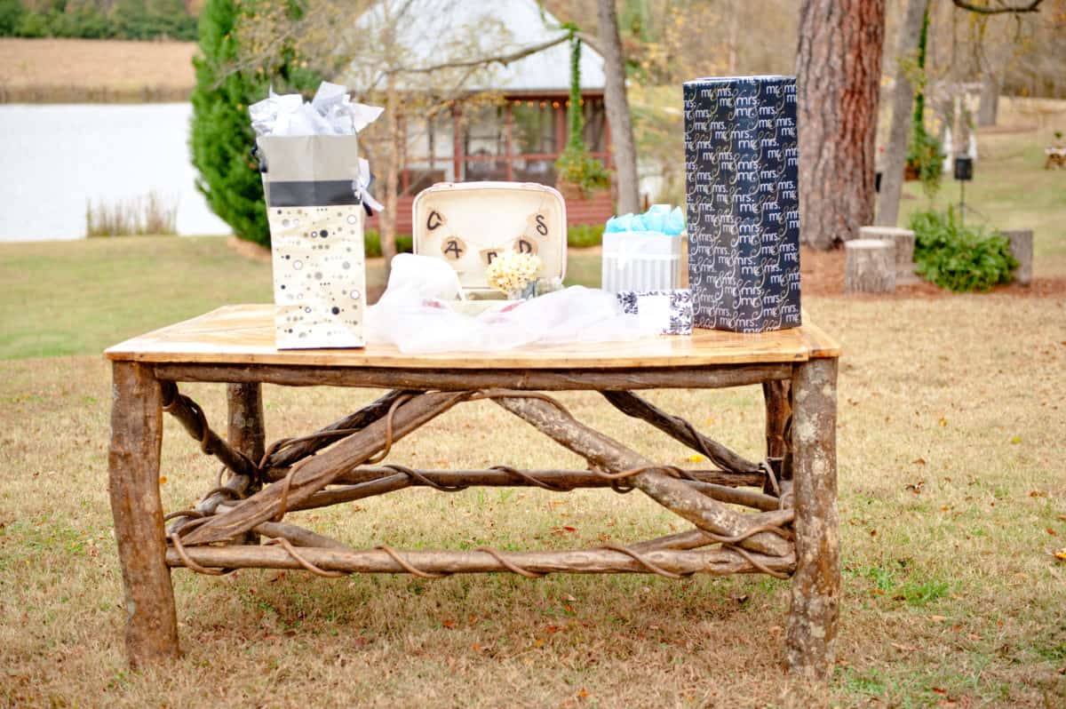 gift table at rustic outdoor vintage wedding